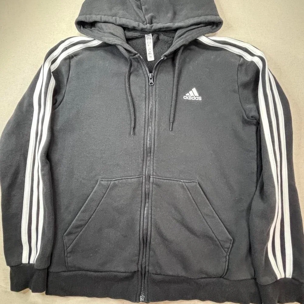 Adidas black zip up hoodie with white stripes on sleeves SZ M